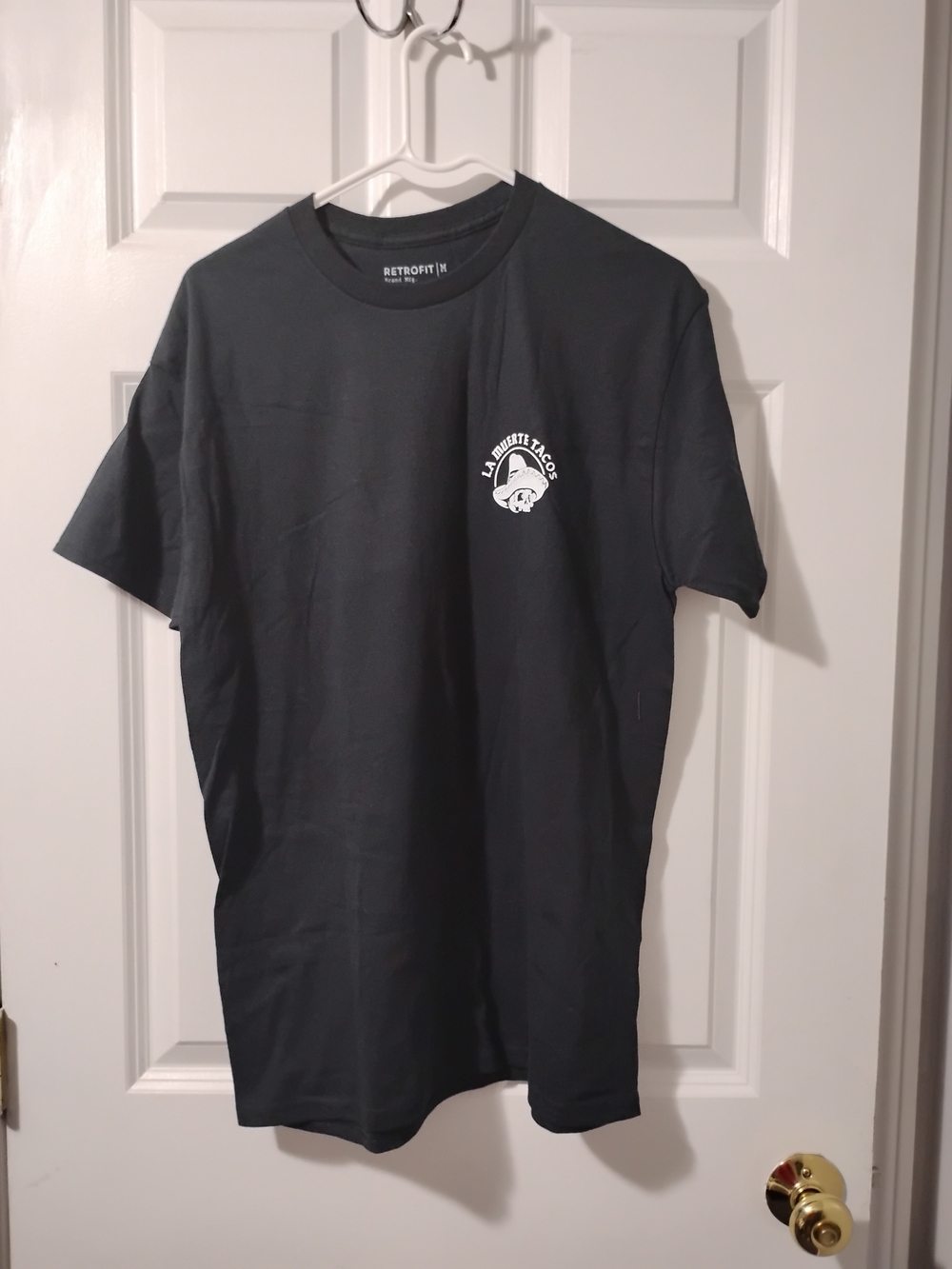 Retrofit Black Short-Sleeve Crew Neck Tee with Small White Logo